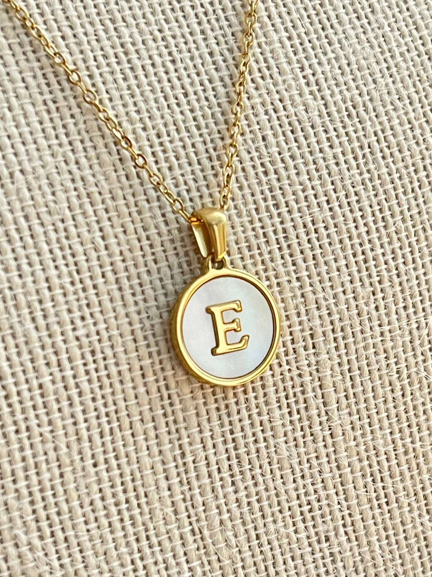 Gold Stainless Steel/Mother of Pearl Letter E Necklace